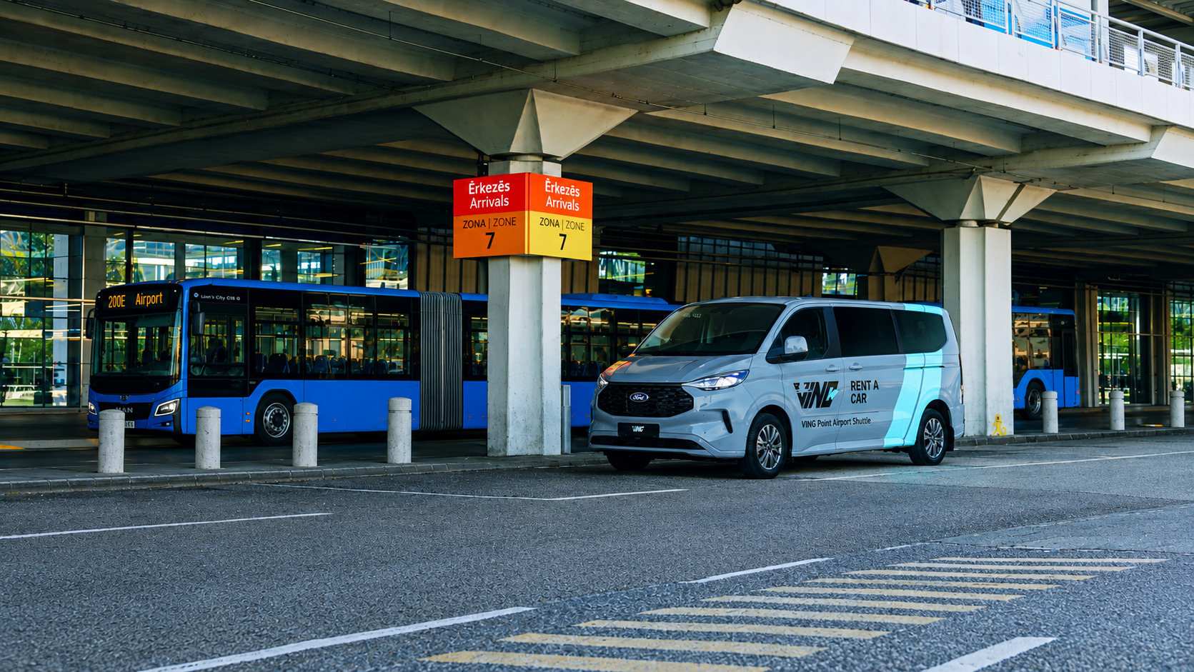 VING-branded shuttle minibus with a turquoise stripe at the airport